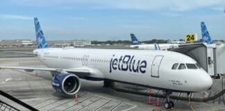 a jet plane parked on a tarmac
