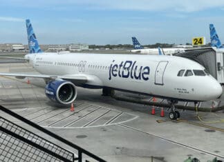 a jet plane parked on a tarmac