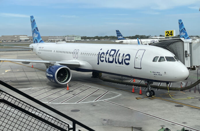 a jet plane parked on a tarmac