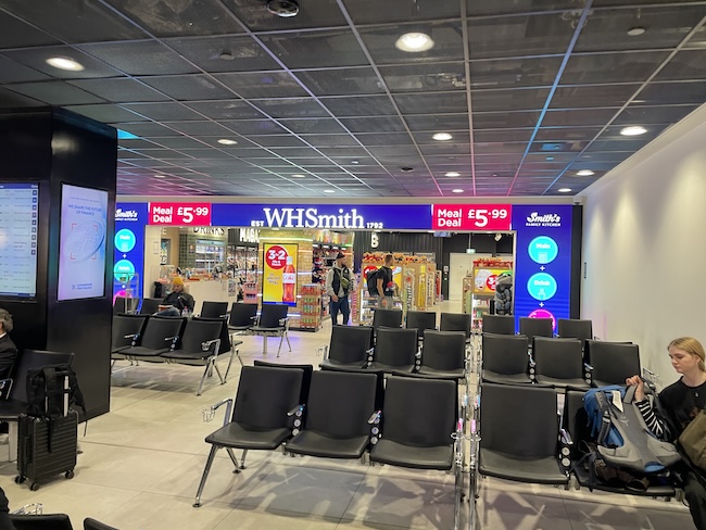 a group of chairs in a airport