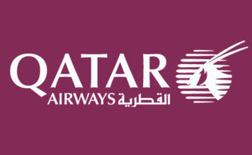 a logo on a purple background