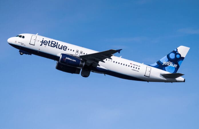 a jet plane flying in the sky