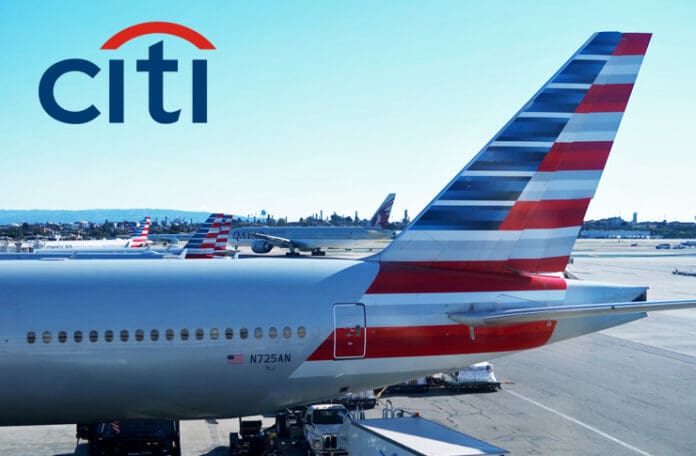 a group of airplanes parked at an airport