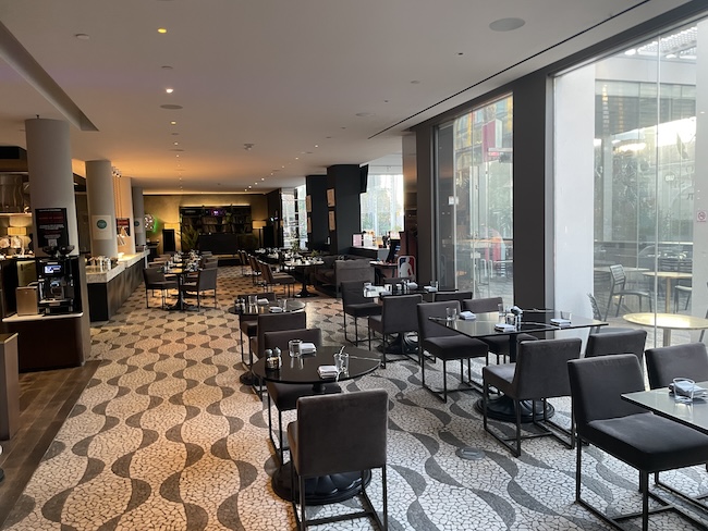 a restaurant with tables and chairs