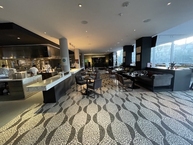 a restaurant with tables and chairs