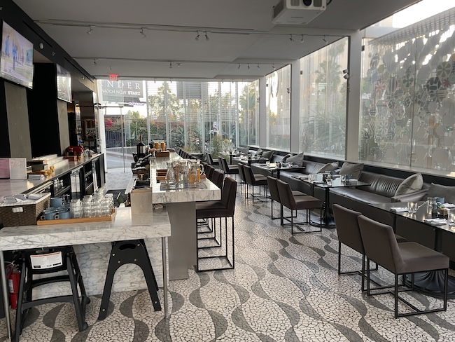 a restaurant with tables and chairs