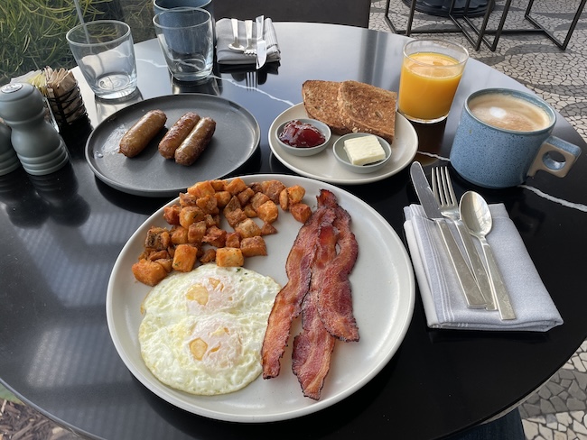 a plate of breakfast food on a table