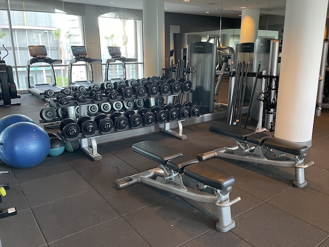 a gym with weights and exercise equipment