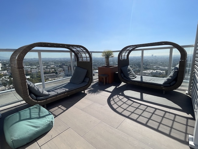 a group of chairs on a rooftop