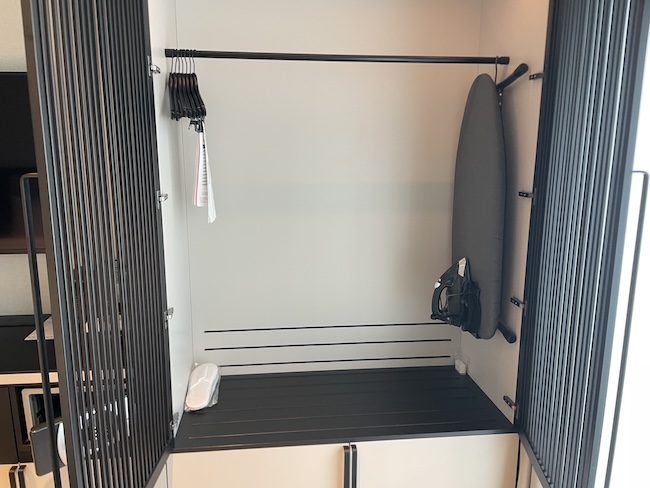 a ironing board in a closet