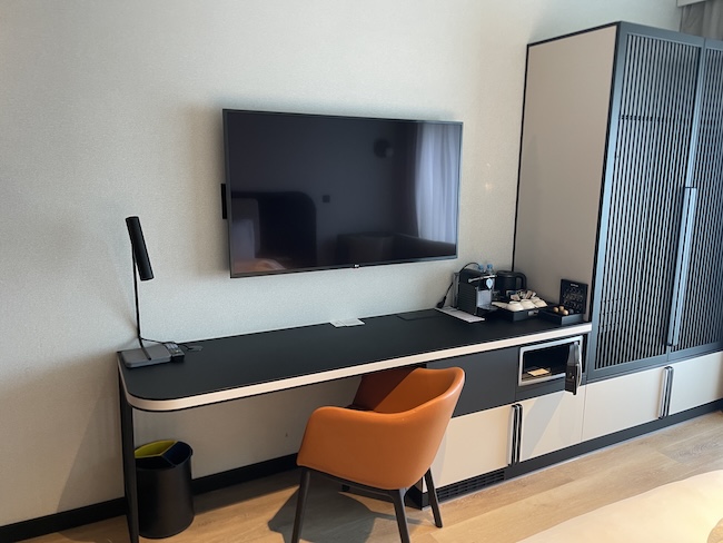 a desk and chair in a room