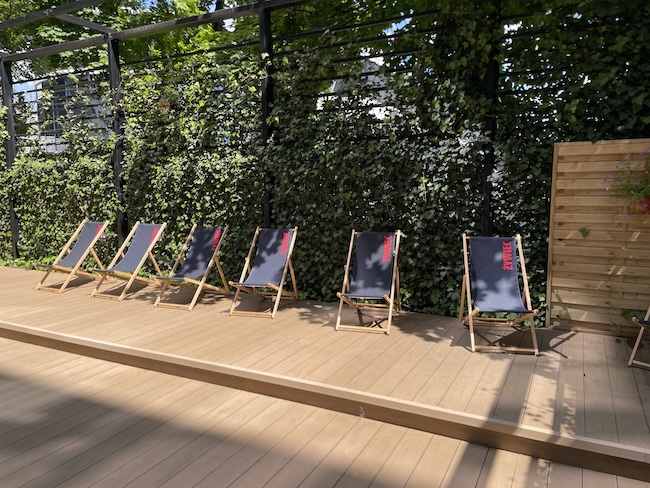 a group of chairs on a deck