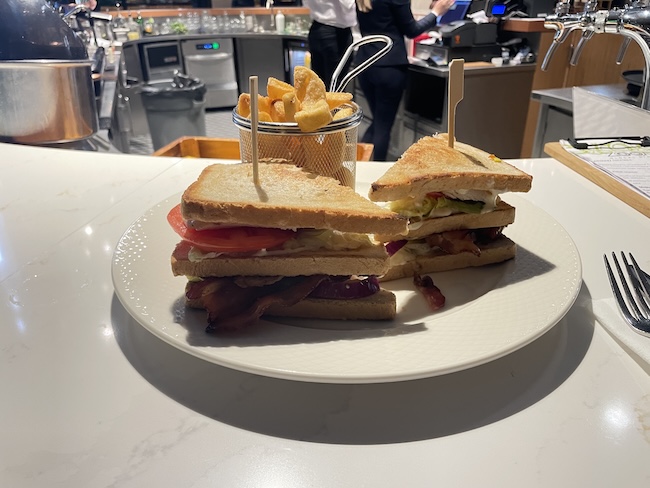 a plate of sandwiches and fries