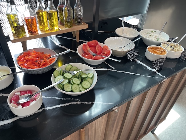a buffet table with different types of food