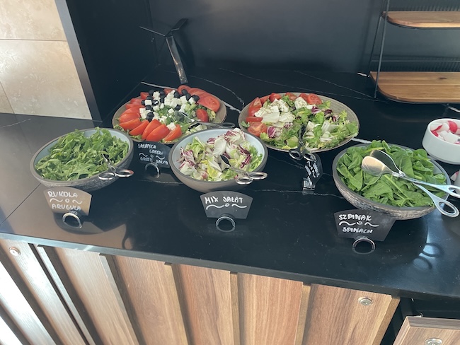a salad in bowls on a counter