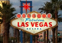 a sign with a star on it with Welcome to Fabulous Las Vegas sign in the background
