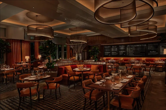 a restaurant with tables and chairs