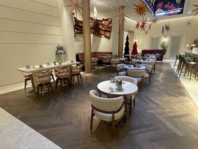 a room with tables and chairs