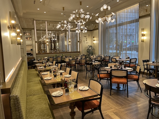 a restaurant with tables and chairs
