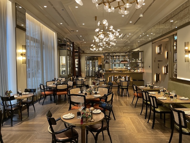 a restaurant with tables and chairs