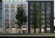 a building with trees in front of it