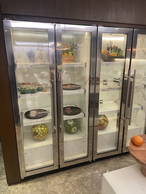 a refrigerator with glass doors