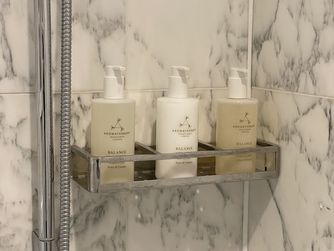 a group of soaps on a shelf