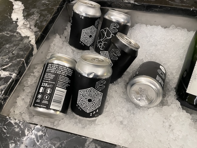 cans in a cooler with ice