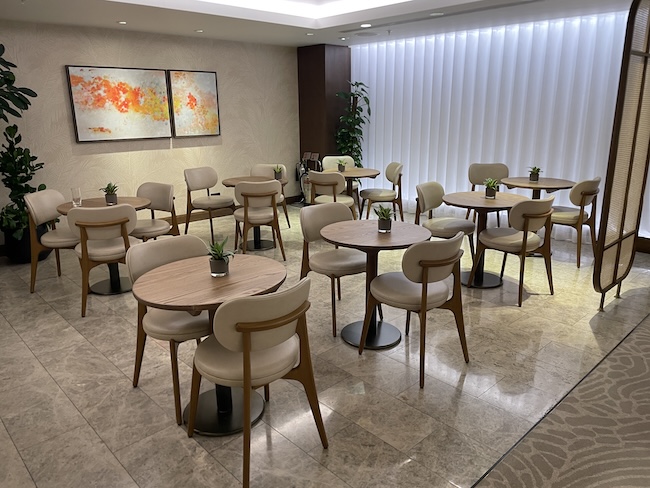 a room with tables and chairs