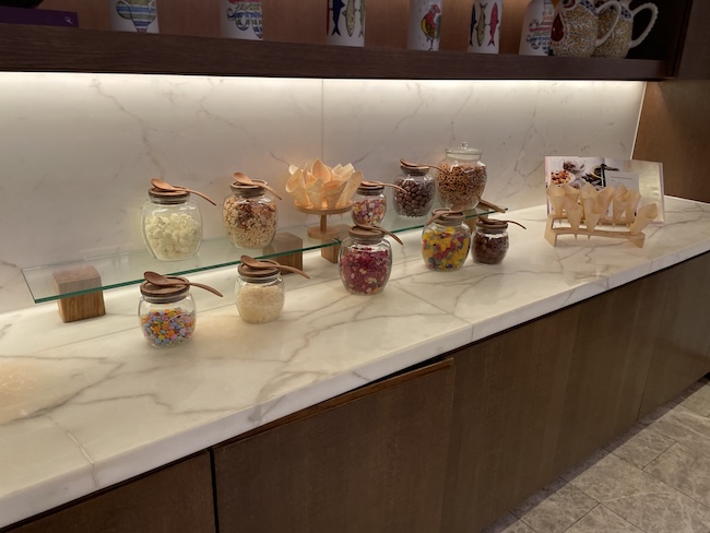 a counter with glass jars of food