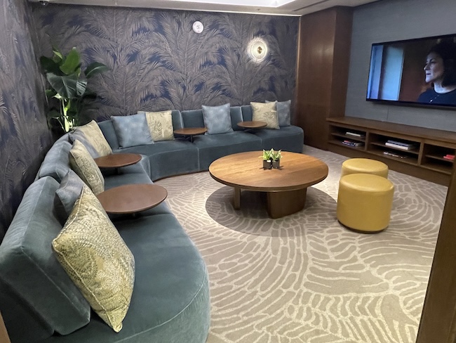 a room with a couch and a television