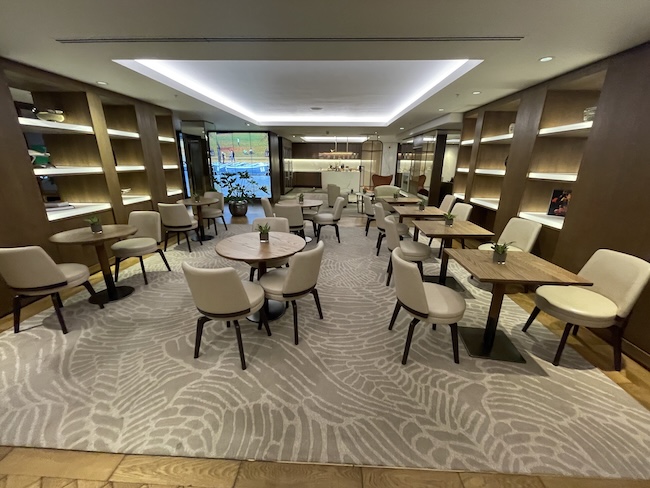 a room with tables and chairs