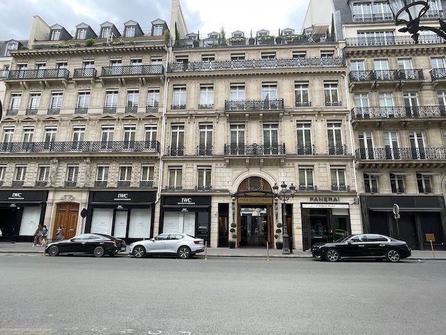 a building with cars parked on the side of it
