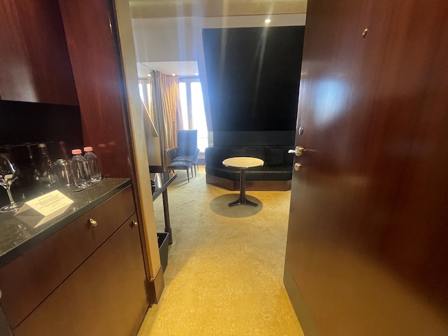a room with a table and chairs
