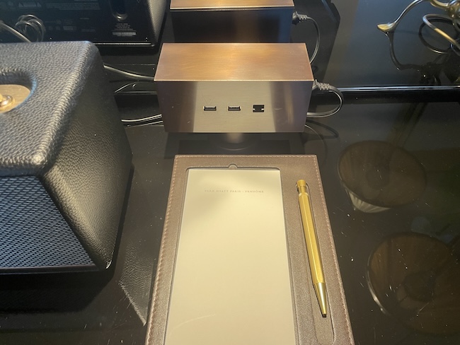 a tablet and a pen on a table