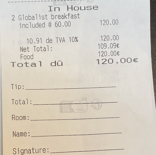 a receipt of food on a table