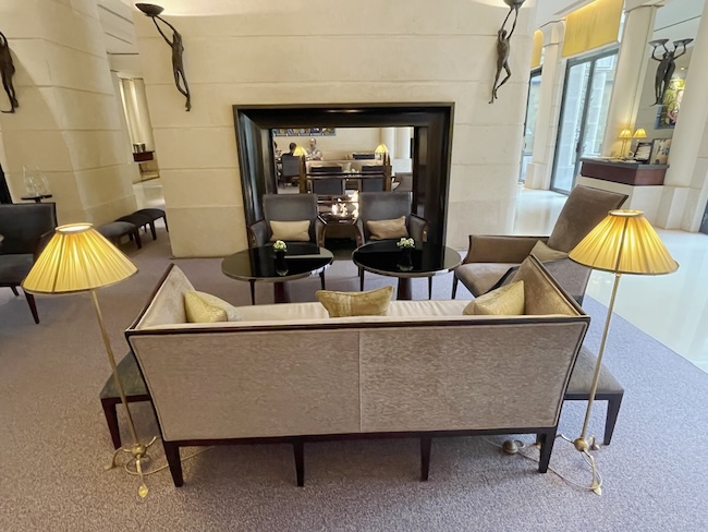 a room with a couch and a mirror