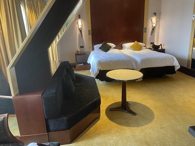 a room with a bed and a table