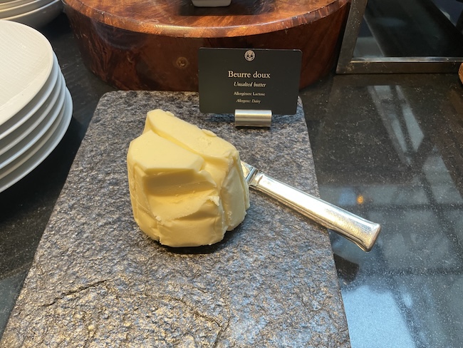 a butter on a stone surface