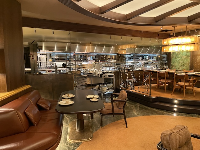a room with a table and chairs