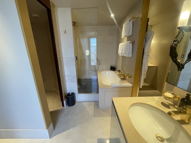 a bathroom with a sink and shower