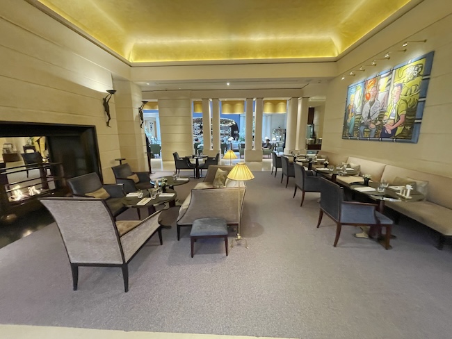 a room with chairs and tables