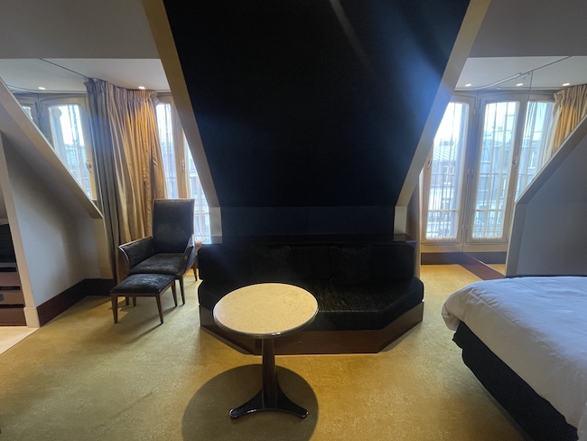 a room with a bed and a table