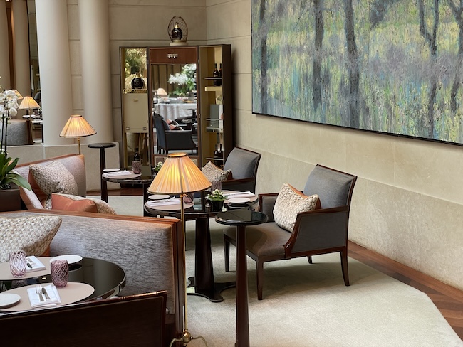 a room with a large painting on the wall