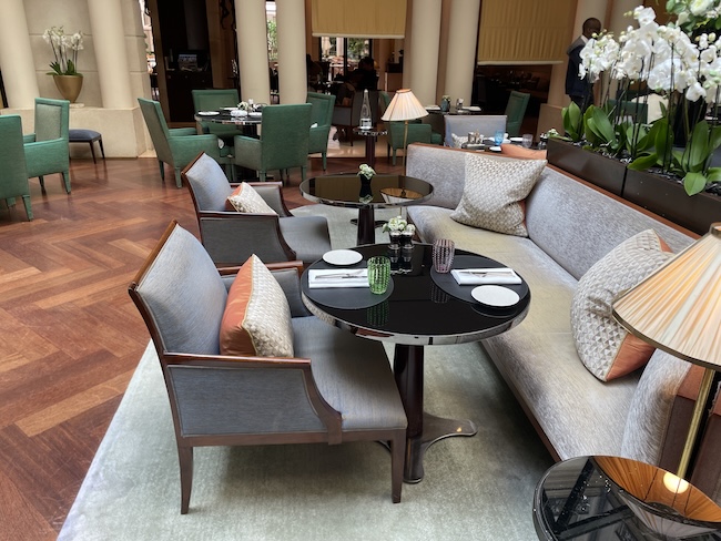 a room with a couch and tables