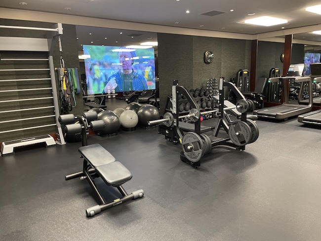 a gym with weights and exercise equipment