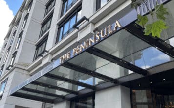 a building with a glass canopy over it