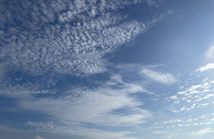 a blue sky with white clouds