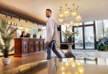 a man walking in a hotel lobby
