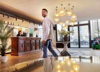 a man walking in a hotel lobby